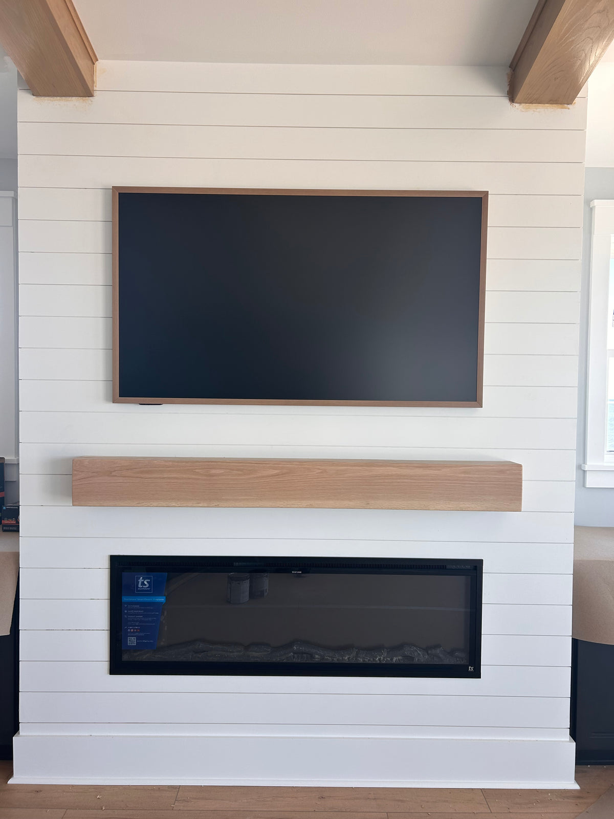 Custom fireplace surround with detailed trim work in Shallotte NC home
